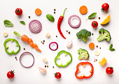 Healthy flat lay of sliced vegetables composition