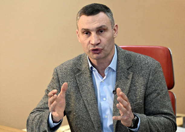 Heavyweight boxing champion, turned Kyiv mayor Vitali Klitschko, talks to AFP journalists at his office in Kyiv on February 10, 2022. - Vitali...