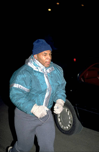 heavyweight-boxing-mike-tyson-jogging-the-morning-before-his-trial-picture-id107929095