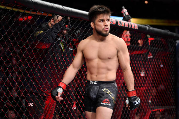 Henry Cejudo stands in his corner prior to his bantamweight championship bout against Marlon Moraes of Brazil during the UFC 238 event at the United...