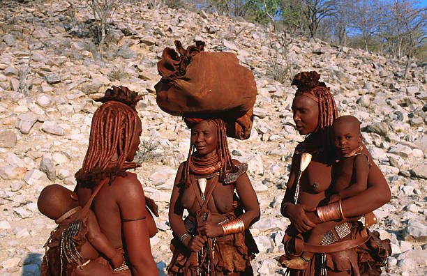 himba tribe mothers with babies. - the himba peple stock pictures, royalty-free photos & images