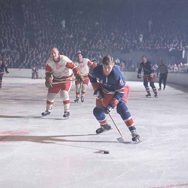 hockey-new-york-rangers-vic-hadfield-in-action-taking-shot-vs-detroit-picture-id81346791