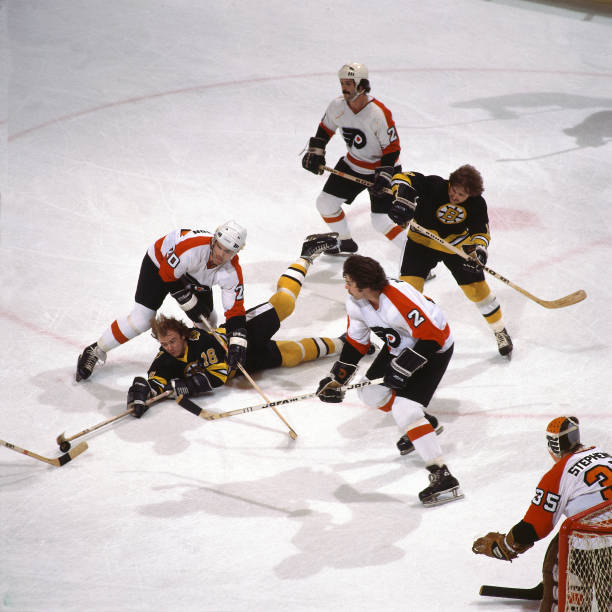 hockey-nhl-playoffs-boston-bruins-rick-middleton-in-action-taking-picture-id482733919