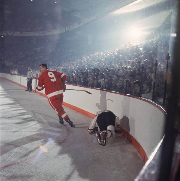hockey-nhl-playoffs-detroit-red-wings-gordie-howe-in-action-skating-picture-id171659596
