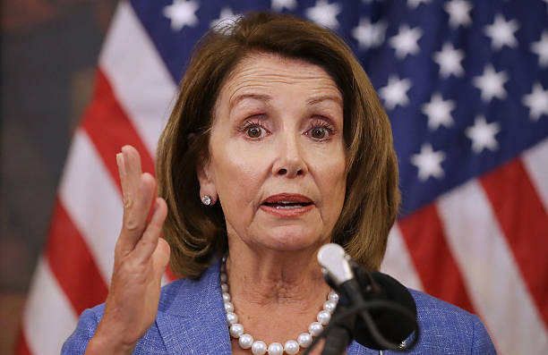 House Minority Leader Nancy Pelosi and fellow Democratic members of the House hold a news conference to call on Republicans to fund programs to...