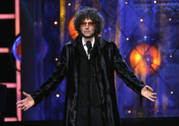 Howard Stern inducts Bon Jovi on stage during the 33rd Annual Rock & Roll Hall of Fame Induction Ceremony at Public Auditorium on April 14, 2018 in...