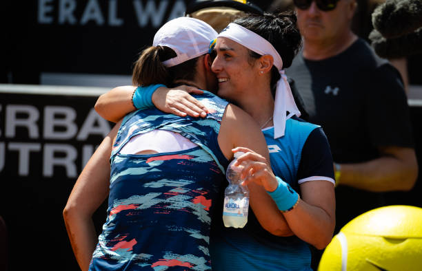 Iga Swiatek of Poland and Ons Jabeur of Tunisia embrace after the womens singles final during Day 8 of the Internazionali BNL D'Italia at Foro...