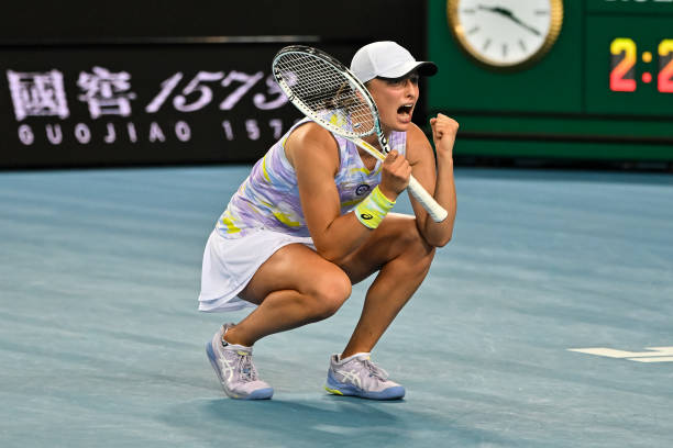 Iga Swiatek of Poland celebrates her victory over Sorana Cirstea of Romania during day eight of the 2022 Australian Open at Melbourne Park on January...