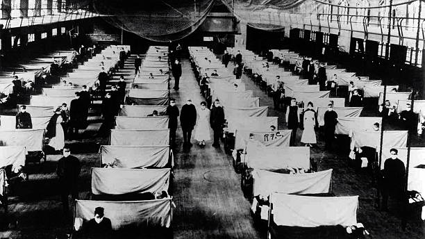 Image shows warehouses that were converted to keep the infected people quarantined. The patients are suffering from the 1918 Influenza pandemic, a...