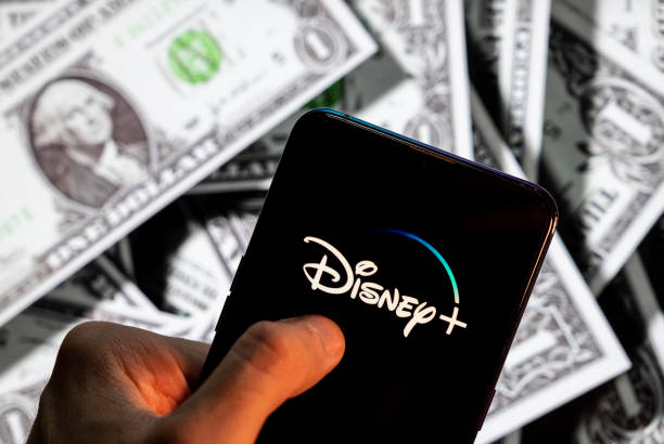 In this photo illustration the online video streaming subscription service platform owned and operated by Disney, Disney+ , logo seen on an Android...