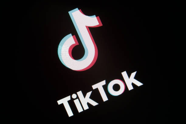 In this photo illustration, the social media application logo, Tik Tok is displayed on the screen of a tablet on November 07, 2018 in Paris, France....