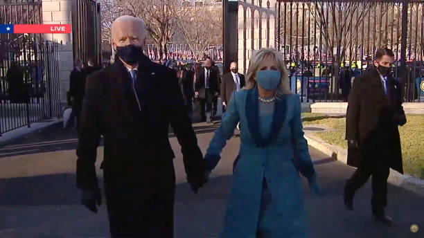In this screengrab, US President Joe Biden and US First Lady Jill Biden is seen during the Virtual Parade Across America on January 20, 2021....