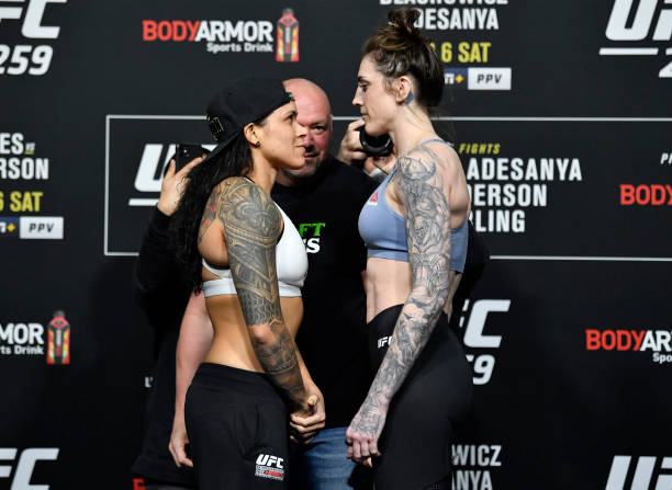 In this UFC handout, Opponents Amanda Nunes of Brazil and Megan Anderson of Australia face off during the UFC 259 weigh-in at UFC APEX on March 05,...