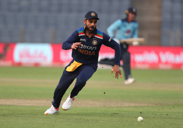 India captain Virat Kohli chases a ball in the field during the 2nd One Day International between India and England at MCA Stadium on March 26, 2021...
