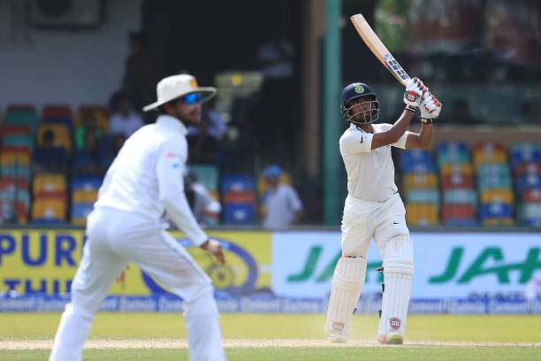 Indian cricketer Wriddhiman Saha plays a shot during the 2nd Day's play in the 2nd Test match between Sri Lanka and India at the SSC international...