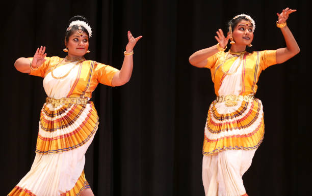 Indian dancers perform a classical Mohiniyattam dance in Brampton, Ontario, Canada during the Vishu Festival. Vishu is a major annual event for...