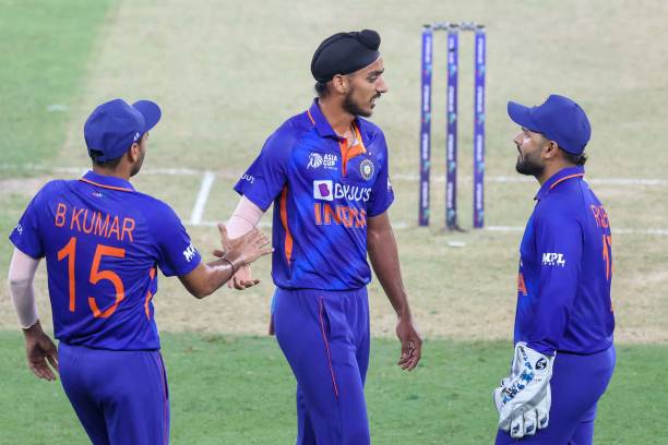 India's Arshdeep Singh celebrates with teammates after dismissing Hong Kong's Yasim Murtaza during the Asia Cup Twenty20 international cricket match...
