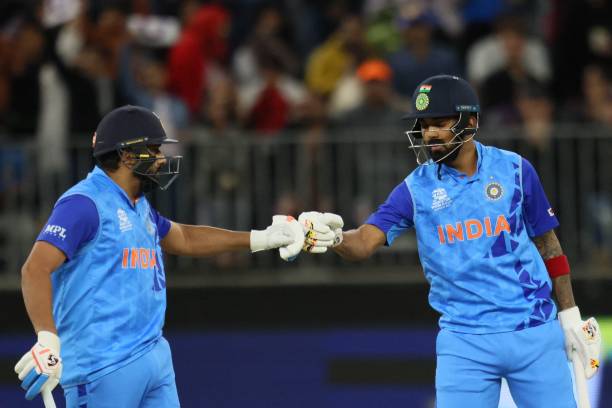 India's captain Rohit Sharma and his teammate KL Rahul bump their fists during the ICC men's Twenty20 World Cup 2022 cricket match between India and...
