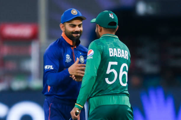 India's captain Virat Kohli and his Pakistan's counterpart Babar Azam greet each other before the start of the ICC mens Twenty20 World Cup cricket...
