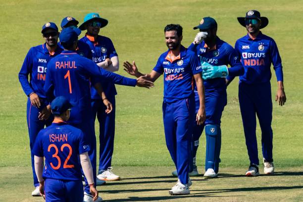 India's Deepak Chahar celebrates with teammates after the dismissal of Zimbabwe's Wessly Madhevere during the first one-day international cricket...