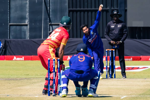 India's Kuldeep Yadav delivers a ball to Zimbabwe's Sikandar Raza during the first one-day international cricket match between Zimbabwe and India at...