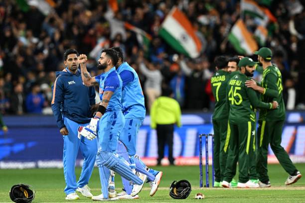 India's Virat Kohli celebrates as Pakistani players react on their loss during the ICC men's Twenty20 World Cup 2022 cricket match between India and...