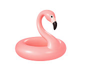 Inflatable pink flamingo isolated on white