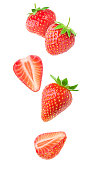 Isolated falling strawberries