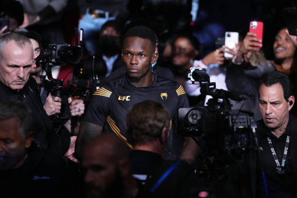 Israel Adesanya of Nigeria walks out prior to facing Robert Whittaker of Australia in their UFC middleweight championship fight during the UFC 271...