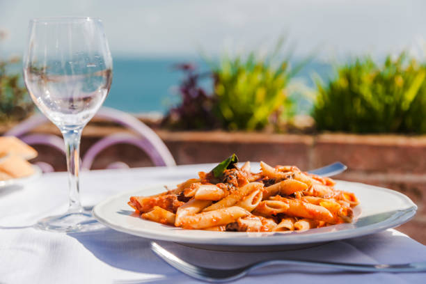 italy atrani plate of penne rigate with tomato sauce and tuna picture