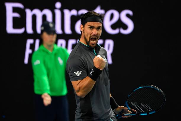 Italy's Fabio Fognini reacts after a point against Australia's Alex De Minaur during their men's singles match on day six of the Australian Open...