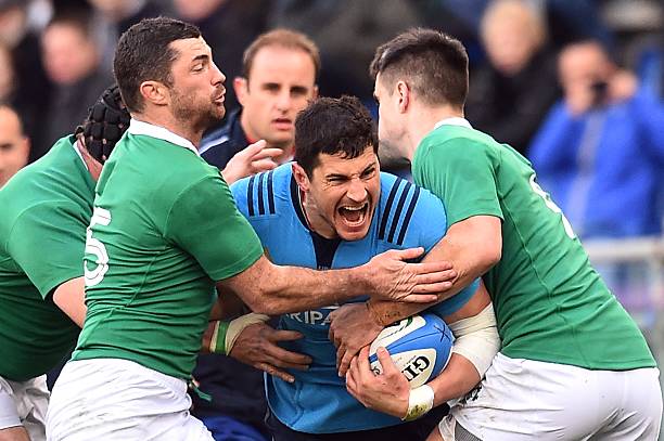 Italy's flanker Alessandro Zanni is tackled by Ireland's fullback Rob Kearney (L) during the Six Nations International Rugby Union match between Italy and Ireland at the Olympic Stadium in Rome on February 7, 2015. AFP PHOTO / GABRIEL BOUYS (Photo credit should read GABRIEL BOUYS/AFP via Getty Images)