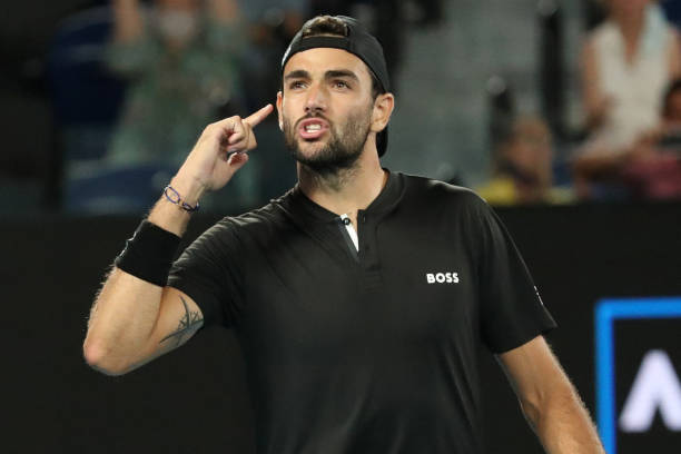 Italy's Matteo Berrettini gestures to the crowd after beating France's Gael Monfils in their men's singles quarter-final match at the Australian Open...