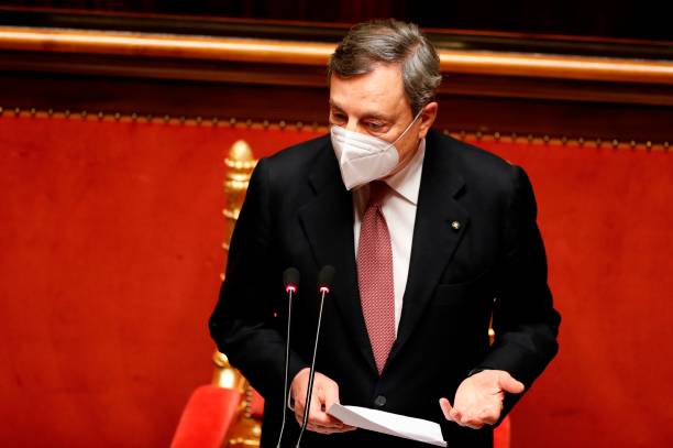 Italy's Prime Minister Mario Draghi delivers a speech during a debate at the Senate on February 17, 2021 in Rome, before submitting his government to...