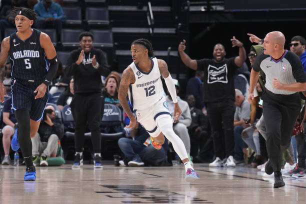 Ja Morant of the Memphis Grizzlies celebrates during a preseason game on October 3, 2022 at FedExForum in Memphis, Tennessee. NOTE TO USER: User...