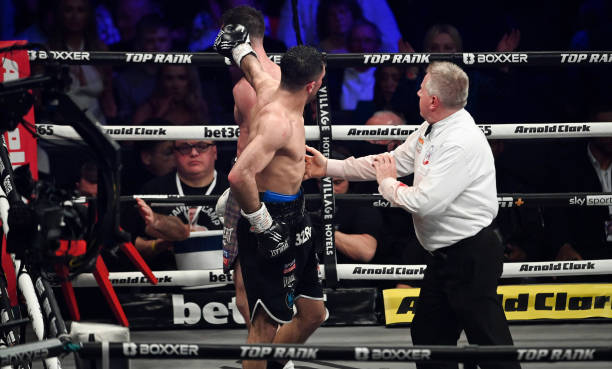 Jack Catterall reacts after Josh Taylor catches him with a punch after the bell during the WBA, WBC, WBO & IBF world super-lightweight title fight at...