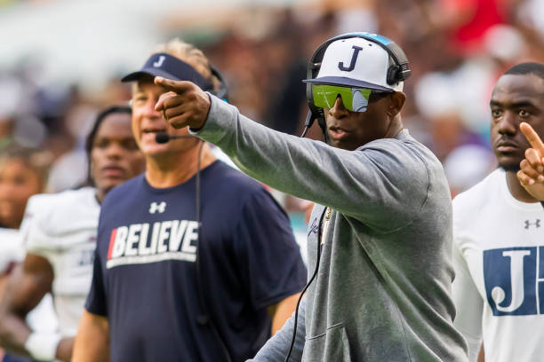 Jackson State Tigers head coach Deion Sanders directs his players during the Orange Blossom Classic game between the Florida A&M Rattlers and the...