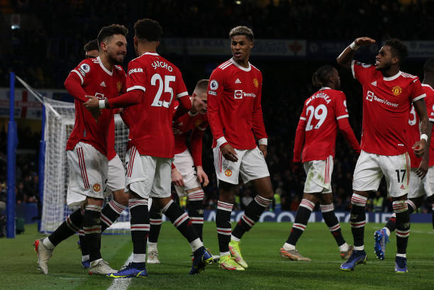 Jadon Sancho of Manchester United celebrates scoring their first goal during the Premier League match between Chelsea and Manchester United at...