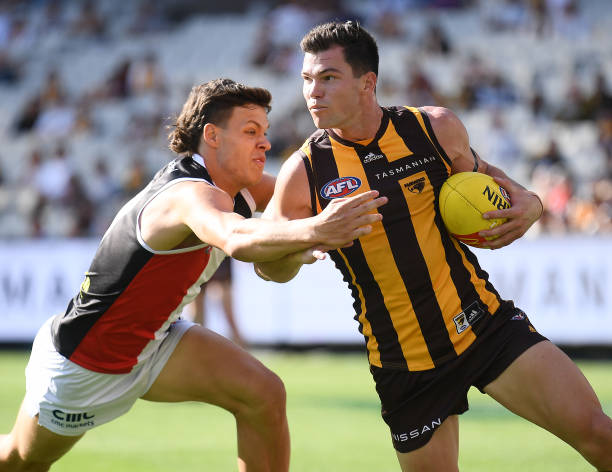 Jaeger O'Meara of the Hawks is tackled during the round four AFL match between the Hawthorn Hawks and the St Kilda Saints at Melbourne Cricket Ground...