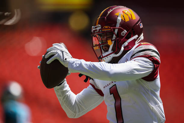 Jahan Dotson of the Washington Commanders warms up before the preseason game against the Carolina Panthers at FedExField on August 13, 2022 in...