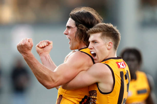 Jai Newcombe of the Hawks celebrates a goal with Dylan Moore of the Hawks during the 2022 AFL Round 10 match between the Hawthorn Hawks and the...