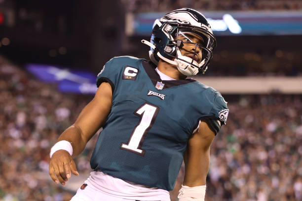 Jalen Hurts of the Philadelphia Eagles looks on against the Minnesota Vikings at Lincoln Financial Field on September 19, 2022 in Philadelphia,...