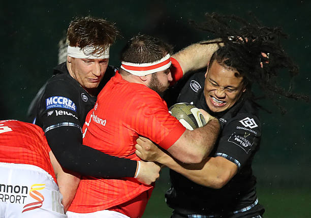 GLASGOW, SCOTLAND - NOVEMBER 23: James Cronin of Munster vies with TJ Ioane of Glasgow Warriors at Scotstoun Stadium on November 23, 2020 in Glasgow, Scotland. Sporting stadiums around the UK remain under strict restrictions due to the Coronavirus Pandemic as Government social distancing laws prohibit fans inside venues resulting in games being played behind closed doors. (Photo by Ian MacNicol/Getty Images)