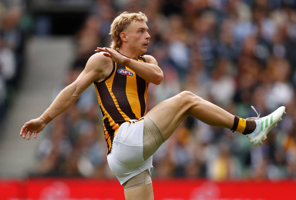 James Worpel of the Hawks kicks the ball during the 2022 AFL Round 03 match between the Carlton Blues and the Hawthorn Hawks at the Melbourne Cricket...