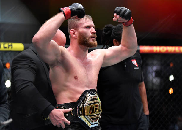 Jan Blachowicz of Poland celebrates after his victory over Israel Adesanya of Nigeria in their UFC light heavyweight championship fight during the...