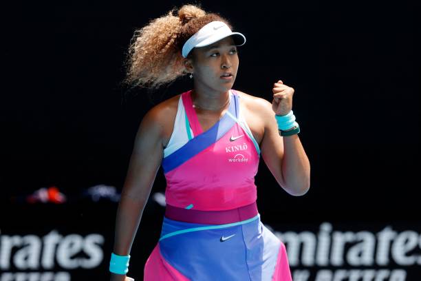 Japan's Naomi Osaka celebrates her match point against Colombia's Camila Osorio during their women's singles match on day one of the Australian Open...