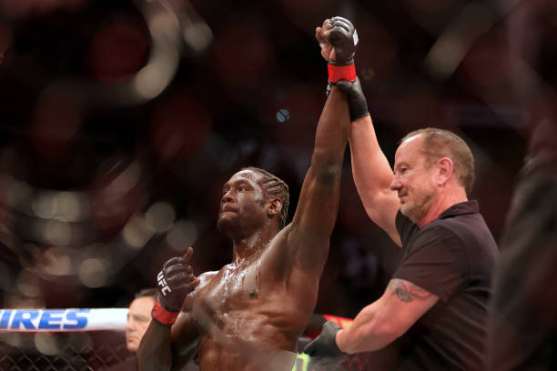 Jared Cannonier reacts after winning his middleweight fight against Derek Brunson via a second-round knockout during UFC 271 at Toyota Center on...
