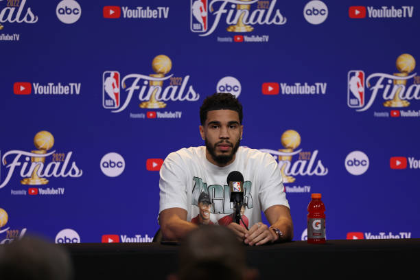 Jayson Tatum of the Boston Celtics talks to the media during a press conference after Game Five of the 2022 NBA Finals against the Golden State...
