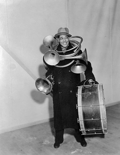 Jazz Musician Duke Ellington Carrying Horns and Drum