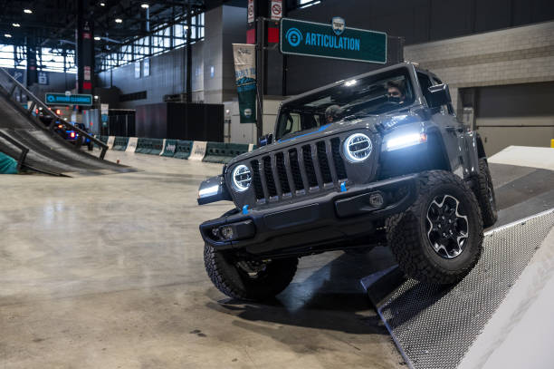 jeep wrangler drives on an obstacle course during the chicago auto picture